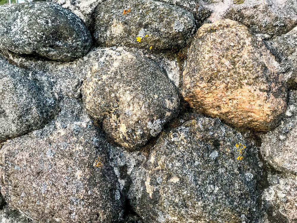 Background, surface of old stone wall. Photo Background, surface of old stone wall. Photo