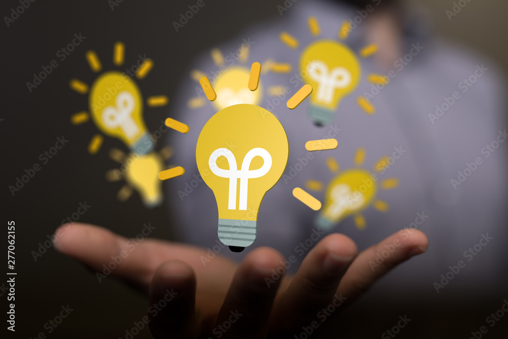 touching light bulbs, new ideas with innovative technology and creativity. touching light bulbs, new ideas with innovative technology and creativity.