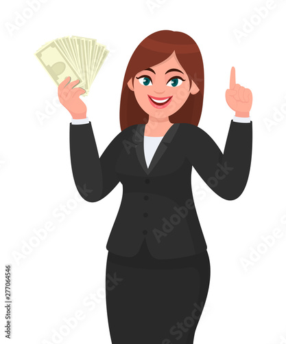 Beautiful young business woman showing, holding bunch of money, cash, dollar, currency, banknotes in hand and pointing index finger up at copy space. Modern lifestyle concept illustration in cartoon.