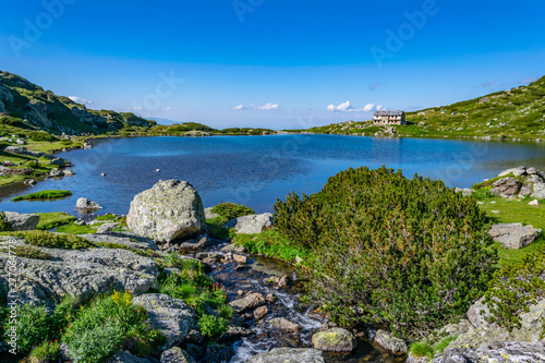 Fish lake, one of the seven rila lakes in Bulgaria with Seven lakes hut photo