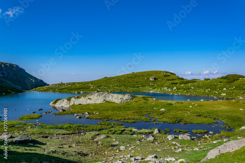 The trefoil lake, one of the seven rila lakes in Bulgaria photo