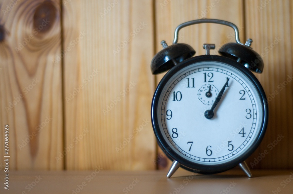 alarm clock on table alarm clock on table