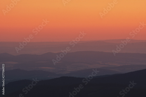 Mountain nature landscape panorama with silhouette layers and valley view at sunset colorful sky. Wolfswarte, Torfhaus, National Park Harz in Germany © Ricardo