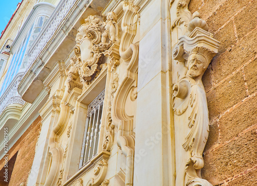 Bas-relieves in a baroque facade. Italian style 17th century. photo