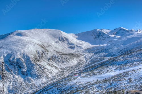 Musala mountain, the highest peak of Bulgaria, and surrounding mountains in Bulgaria during winter photo