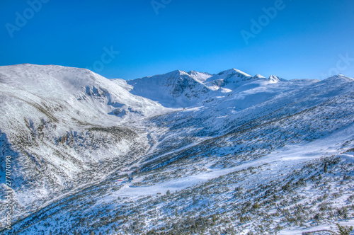 Musala mountain, the highest peak of Bulgaria, and surrounding mountains in Bulgaria during winter photo