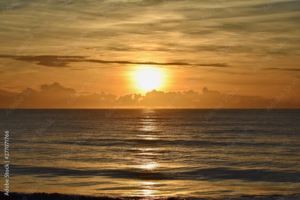 Sunrise over clouds and ocean Sunrise over clouds and ocean