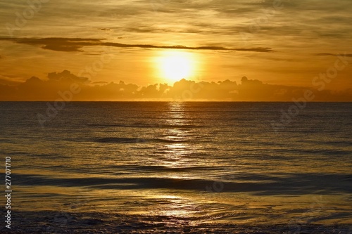 Sunrise over ocean and clouds