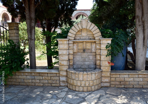 marble fount in a Greek Monastery © Panos