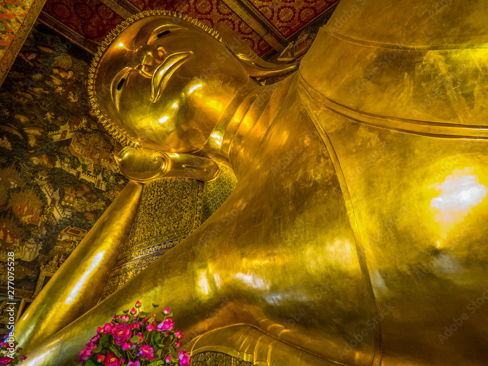 BANGKOK, THAILAND - MARCH 17, 2016: View of the Reclining Buddha in Wat Pho Temple.