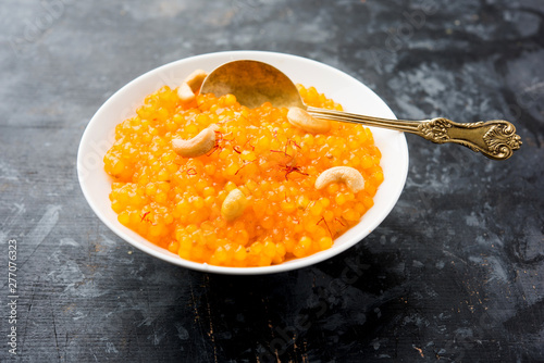 Sabudana or Sago Kesari dessert for Vrat Upvas also known as Sweetened Tapioca Pearl. served in a bowl. selective focus photo