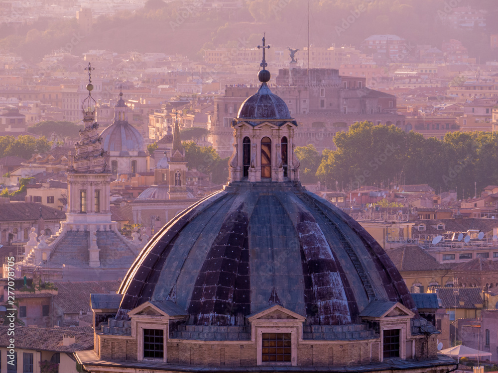 Fototapeta premium Rome, The Holy City - Aerial view of some of the many amazing Christian churches in Rome, Italy. View from the top of the Altare della Patria (English: 