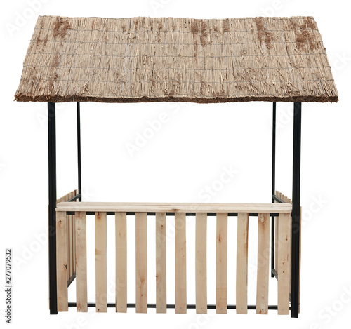 Wooden market stand stall with thatched reed roof awning  photo