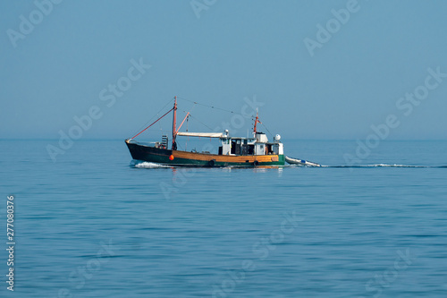 fish trawler on the baltic sea on a sunny day