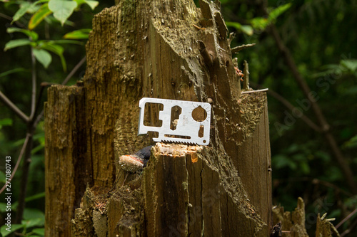 Photos Field knife, multitool. Stuck in a tree.