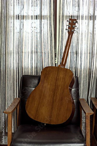 Guitar at home, selective focus (detailed close-up shot)