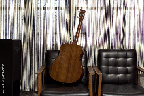 Guitar at home, selective focus (detailed close-up shot)