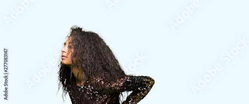 Wallpaper Mural Young beautiful girl with curly hair wearing night party dress Suffering of backache, touching back with hand, muscular pain Torontodigital.ca