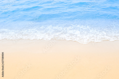 Fantastic Wave of the blue sea on the sand beach background and texture