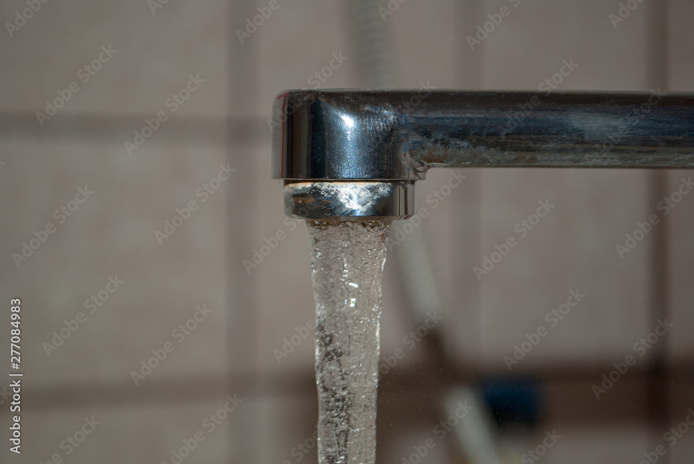 open water tap with selective running water in the bathroom open water tap with selective running water in the bathroom