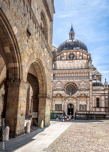 Basilica of Santa Maria Maggiore in Citta Alta, Bergamo, Italy. Historical architecture of Old town or Upper City in Bergamo in summer. Medieval church with ornate facade is a landmark of Bergamo.