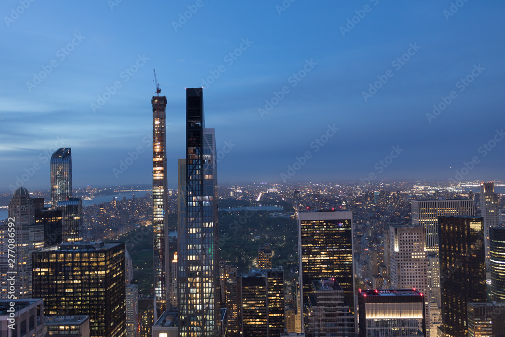 Top view of Manhattan buildings at night, New York.