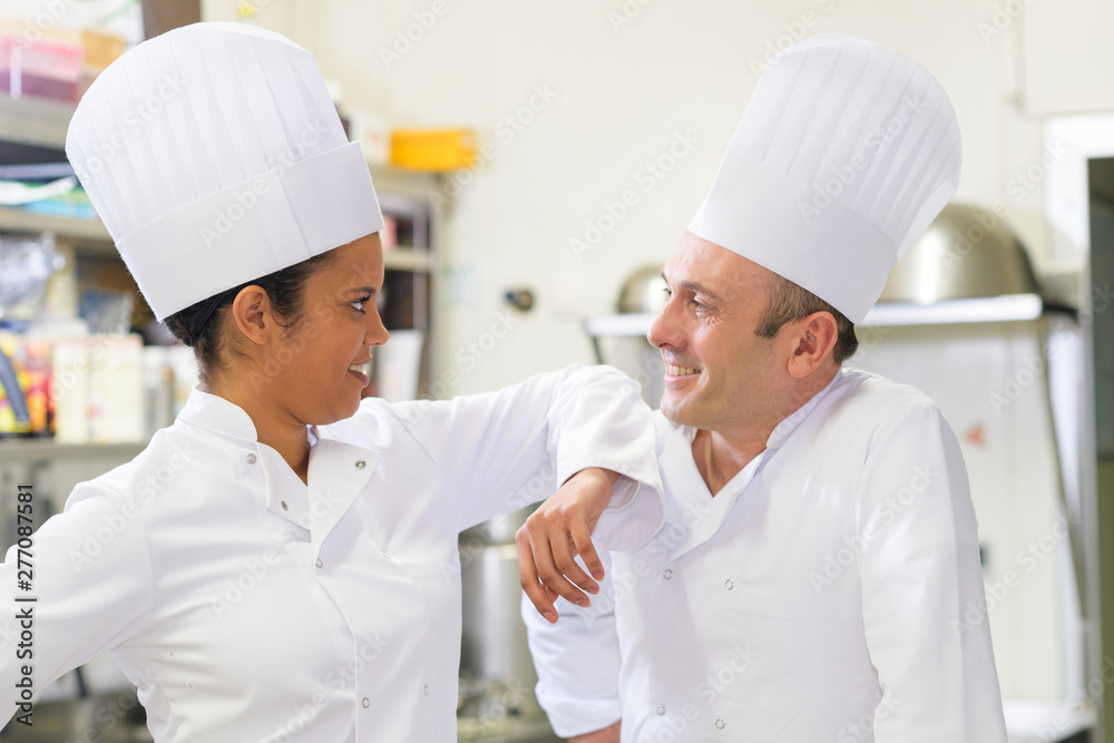 2 cook chef in kitchen