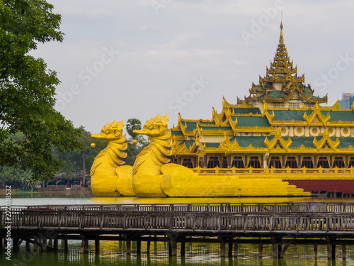 Kandawgyi Lake with the Karaweik Palace in the background. In Yangon, Myanmar photo