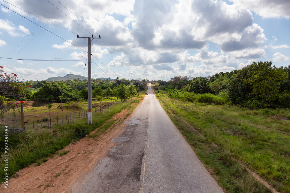 Aerial view of a scenic road in a country side near La Boca, Trinidad, Cuba. Aerial view of a scenic road in a country side near La Boca, Trinidad, Cuba.