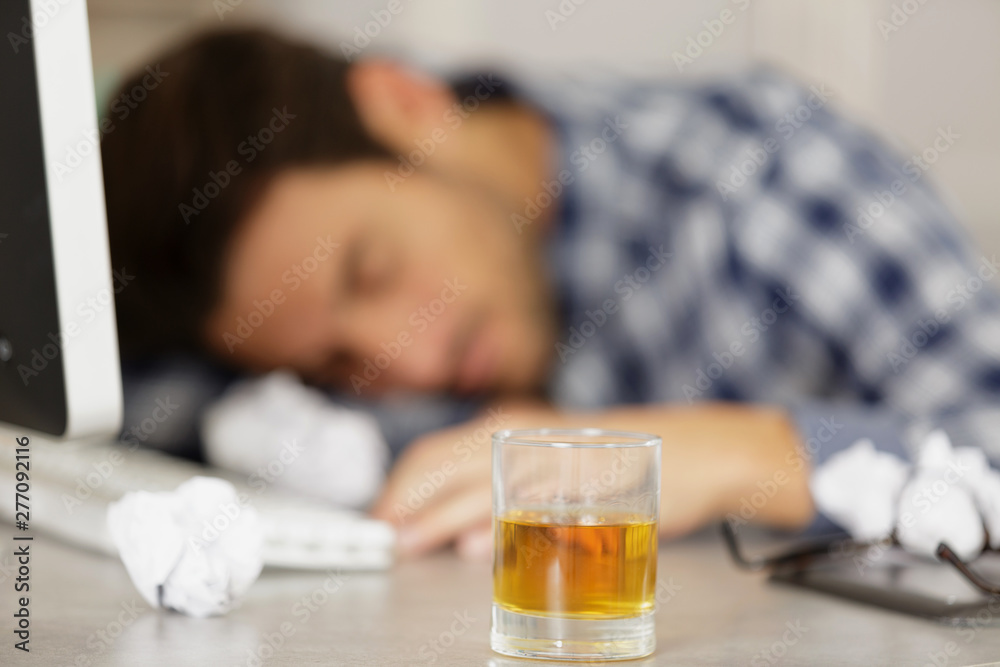 drunk businessman sleeping in office drunk businessman sleeping in office