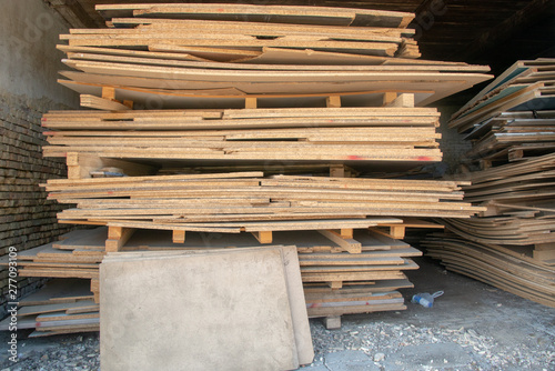 Taking photographs of wood plywood, used for making pellets