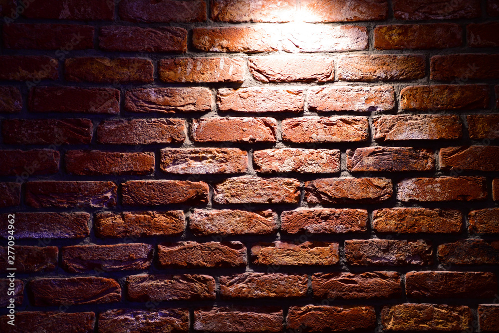 Spotlight above the Brick wall. Brick wall texture. Red brick wallpaper. Background  Red Brick House Wall Texture Closeup. Red brick wall with a single light  from above. Stock Photo | Adobe Stock