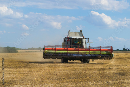 Harvesting wheat and barley modern combine.