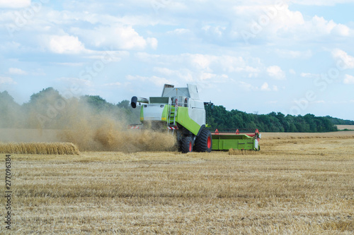 Harvesting wheat and barley modern combine.