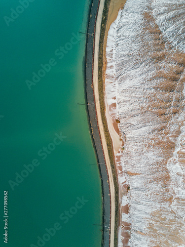Huge potassium salt and sand piles, aerial landscape.