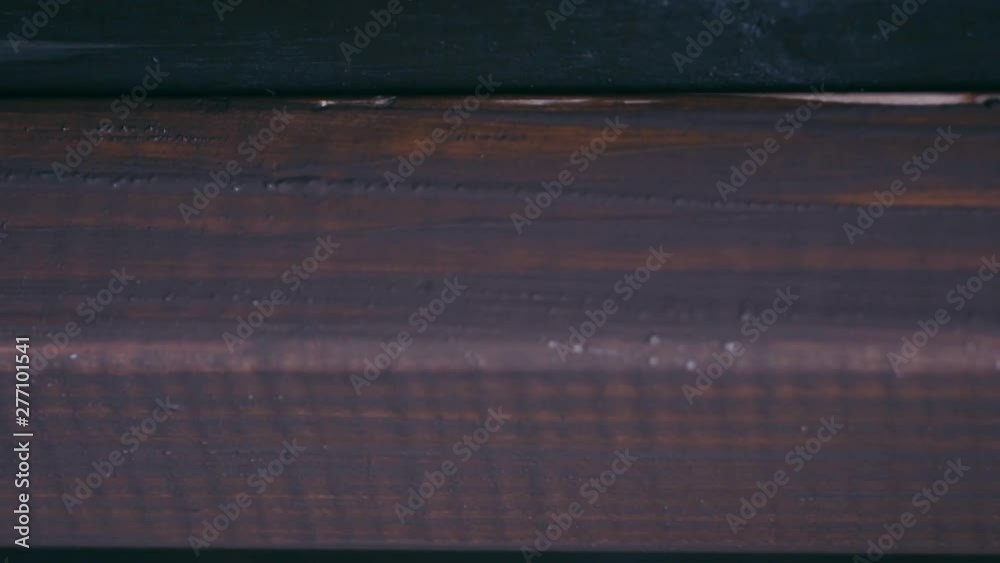 Painting job Painting wooden plank with a paint brush. Slow moution Painting job Painting wooden plank with a paint brush. Slow moution