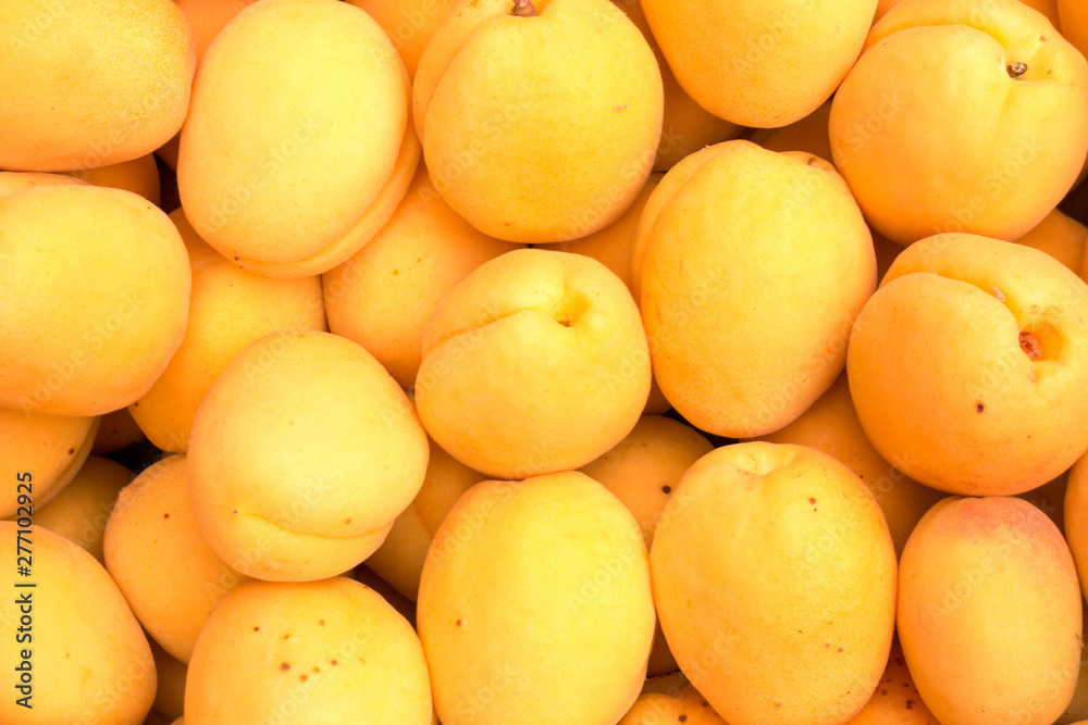 Background of apricots close-up. Background of apricots close-up.