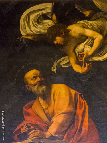 The Inspiration of St. Matthew (Italian: San Matteo e l'Angelo) by Caravaggio in the Contarelli Chapel, San Luigi dei Francesi church, Rome, Italy  photo