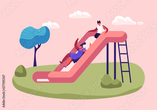 Happy Kids Girls Having Fun Sliding on Outdoor Playground