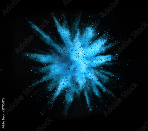 Explosion of colored powder on black background