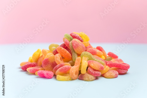 sugary candies isolated on a pink background