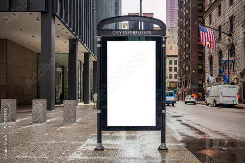 Blank billboard at bus stop for advertising, Chicago city buildings and street background