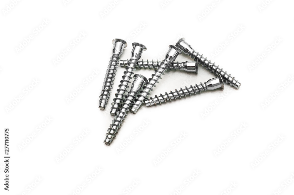 Screws still life large self tapping screws on white background. Selective focus.