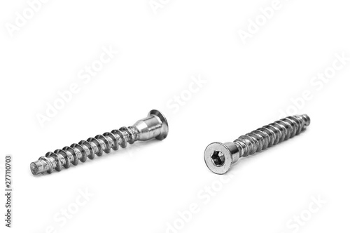 Screws still life large self tapping screws on white background. Selective focus.