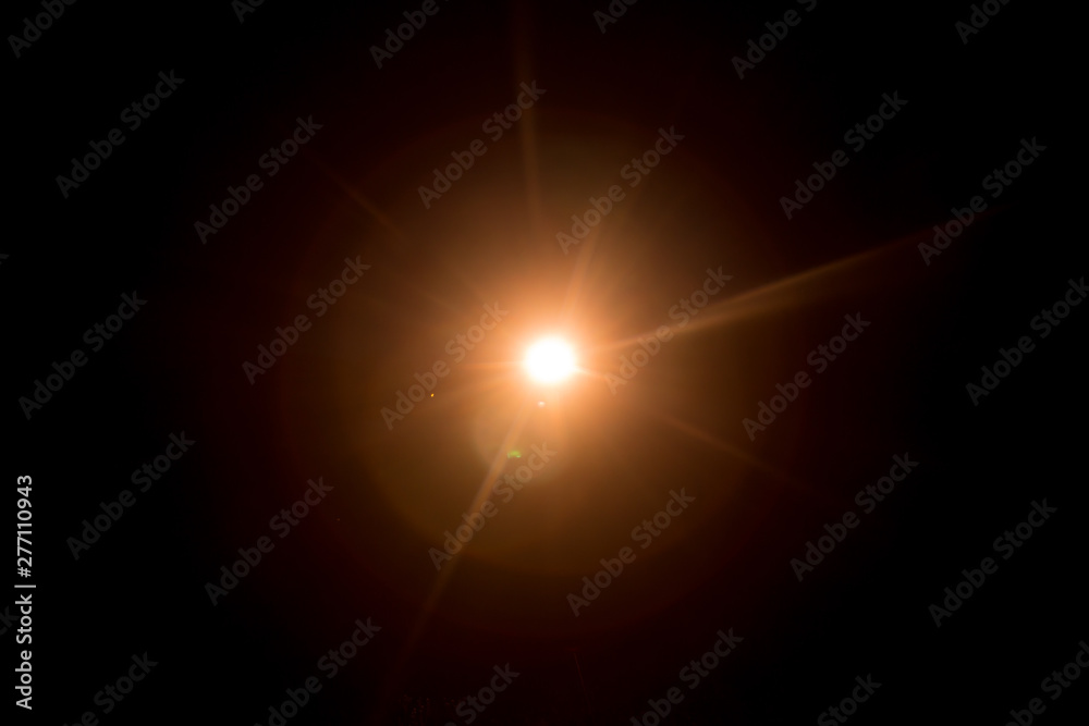 Abstract Natural Sun flare on the black background. Abstract Natural Sun flare on the black background.