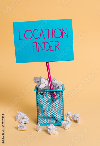 Word writing text Location Finder. Business photo showcasing A service featured to find the address of a selected place crumpled paper trash and stationary with note paper placed in the trash can photo