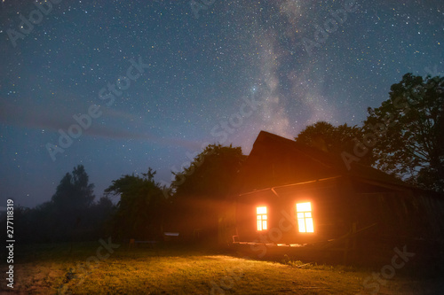 Old house under stars