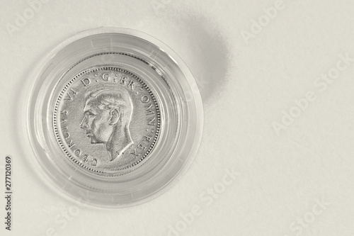 Lucky silver sixpence for wedding on white background