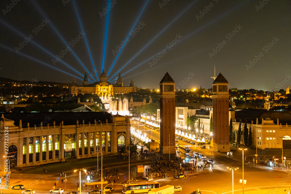 Fototapeta premium Barcelona, Spain - April, 2019: Night view of Plaza de Espana with Venetian towers. Barcelona