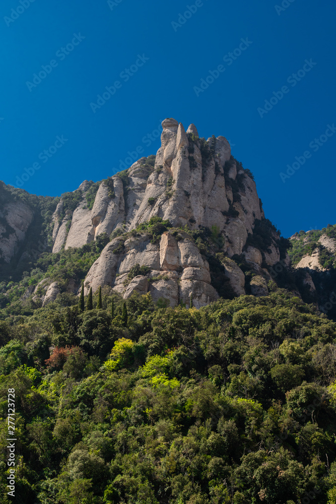 Montserrat, Spain - April, 2019: Santa Maria de Montserrat Abbey in Monistrol de Montserrat, Catalonia, Spain. Famous for the Virgin of Montserrat.